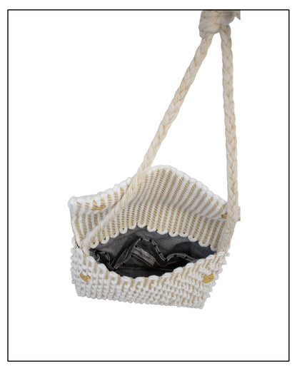 Lining view of an Antonello Tedde Suni Small crossbody bag handwoven in Sardinia in cream Italian linen, ivory and subtle golden yarn with braided strap.