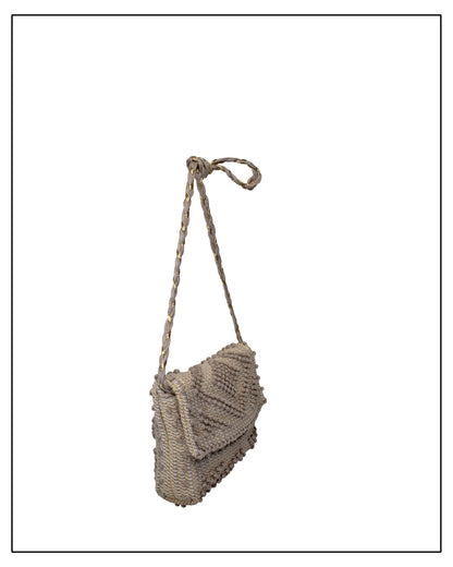 Side view of Antonello Tedde Suni Square crossbody bag handwoven in Sardinia in natural cord linen with subtle golden yarn and braided shoulder strap