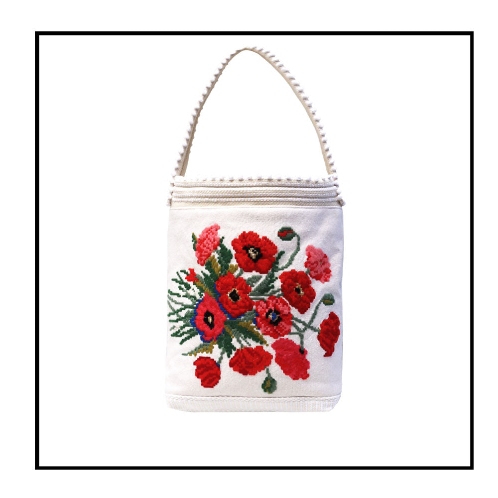 Bultei_bucket bag_red flowers with white ground Best eco luxury bags and accessories brand. Stylish clothes and Eco-Friendly with recycled yarns #luxury #ecoconcious #sustainablestyle #ethicalbrands #ecoliving #ecofashion #ecostyle #ethicalhandbags #handbags
