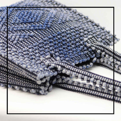 DETAIL TOP VIEW OF MELANGE BLUE with BLACK GROUND SQUARE TOTE bag to complete your look with our selection of accessories crafted with the environment in mind
