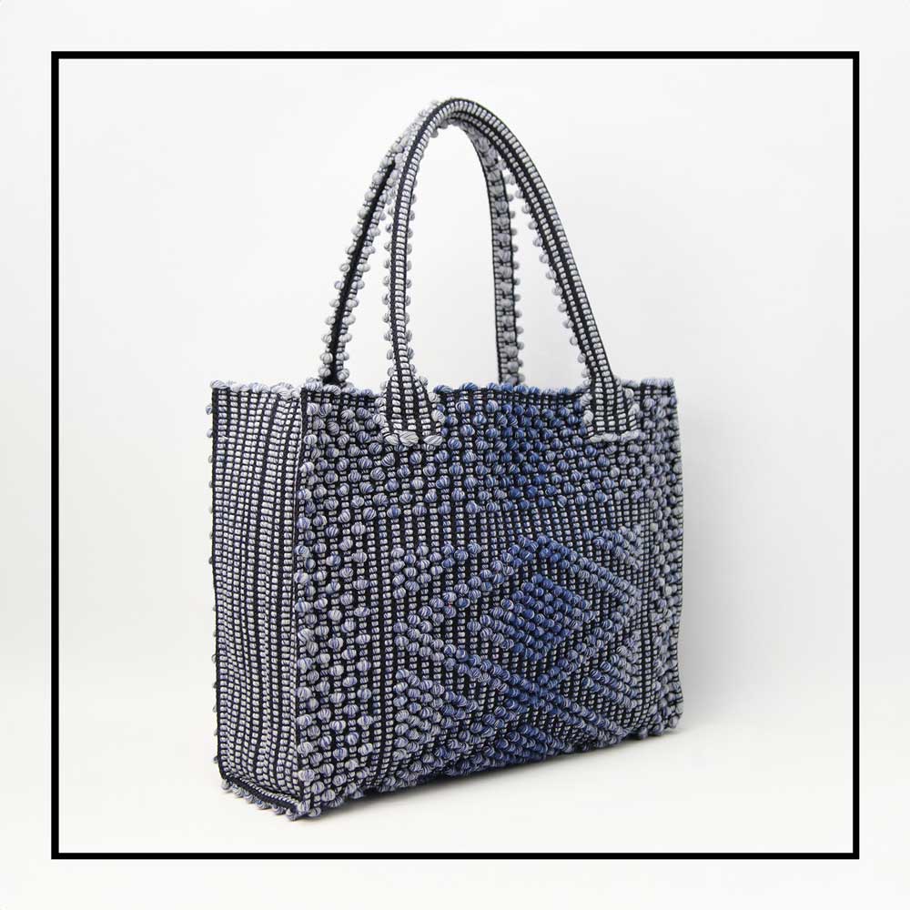 SIDE VIEW OF MELANGE BLUE with BLACK GROUND SQUARE TOTE bag to complete your look with our selection of accessories crafted with the environment in mind