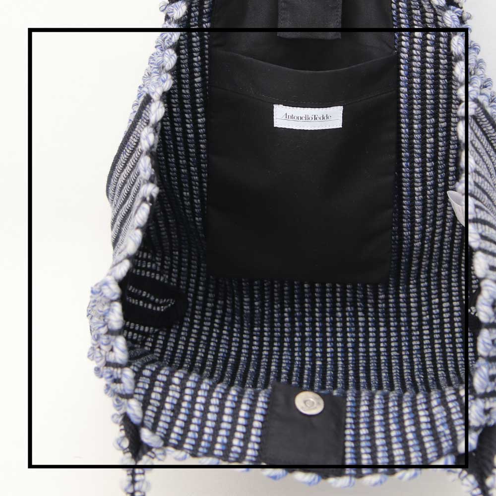 INTERNAL VIEW OF MELANGE BLUE with BLACK GROUND SQUARE TOTE bag to complete your look with our selection of accessories crafted with the environment in mind
