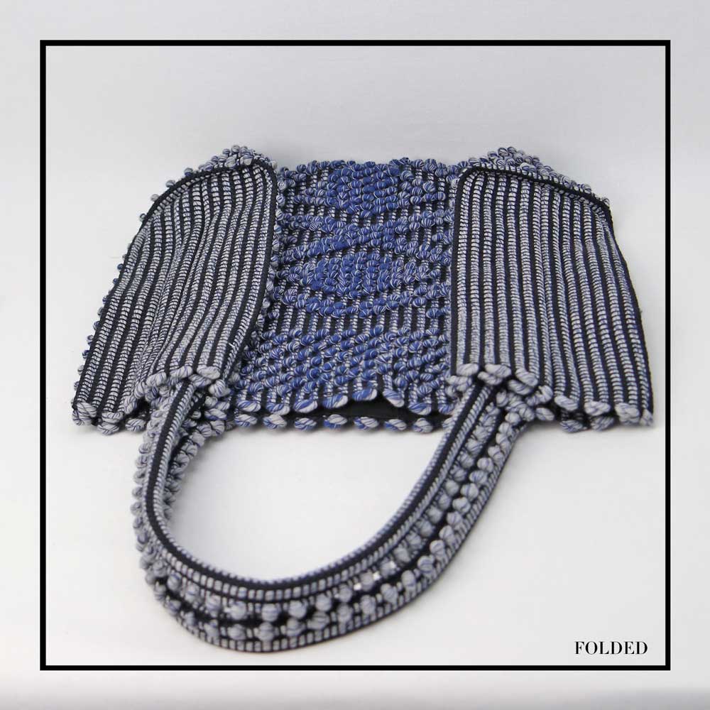 FOLDED VIEW OF MELANGE BLUE with BLACK GROUND SQUARE TOTE bag to complete your look with our selection of accessories crafted with the environment in mind