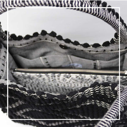 Inside view with zip pocket for HOBO BLACK IN BLACK WITH BLACK BASE  The best eco luxury bags and accessories brand. Stylish clothes and Eco-Friendly with recycled yarns