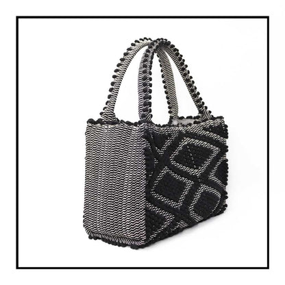 side view for HOBO BLACK IN BLACK WITH BLACK BASE The best eco luxury bags and accessories brand. Stylish clothes and Eco-Friendly with recycled yarns