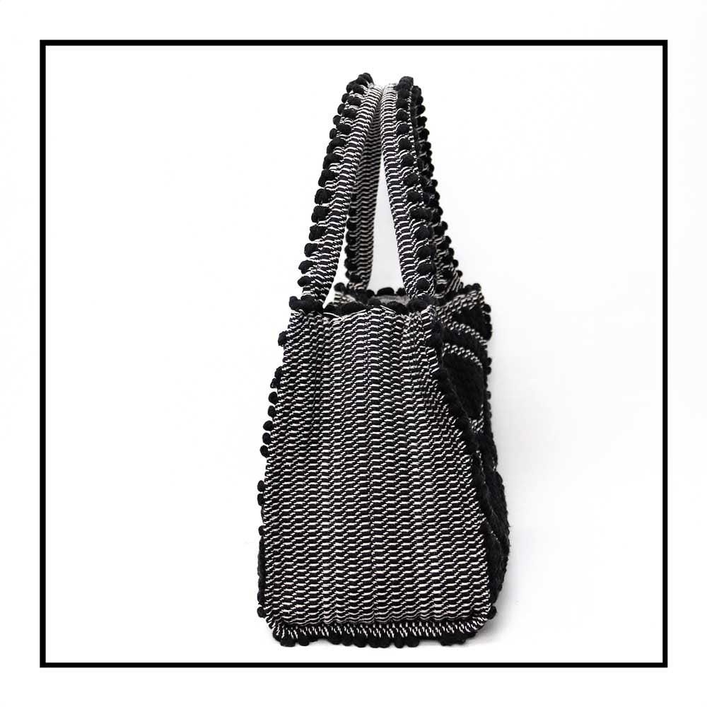 Side view  for HOBO BLACK IN BLACK WITH BLACK BASE The best eco luxury bags and accessories brand. Stylish clothes and Eco-Friendly with recycled yarns
