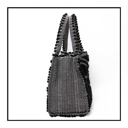Side view  for HOBO BLACK IN BLACK WITH BLACK BASE The best eco luxury bags and accessories brand. Stylish clothes and Eco-Friendly with recycled yarns