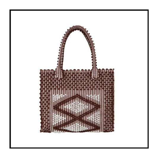 black and grey tote on a model - front view - to complete your look with our selection of accessories crafted with the environment in mind
