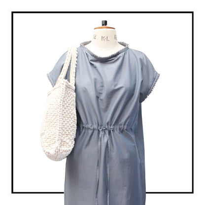 model wearing Medium tote bag cream base chestnut Ethical and Sustainable Handbags. The best eco luxury bags and accessories brand. Stylish clothes and Eco-Friendly with recycled yarns #luxury #ecoconcious #sustainablestyle #ethicalbrands #ethicalhandbags #handbags #sustainablelifestyle #ethicalfashion #sustainability