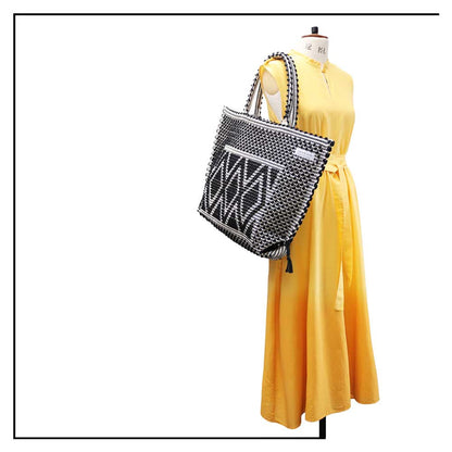 Capriccioli Large - The bag is made using authentic Sardinian hand weaving methods in ethically managed factories. This tote bag is extraordinary and evokes faraway cultures with a contemporary touch, with focus on details such as colour, and material that are sustainable and eco-conscious