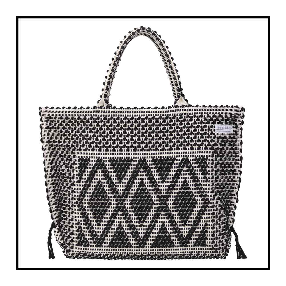 Capriccioli Large - The bag is made using authentic Sardinian hand weaving methods in ethically managed factories. This tote bag is extraordinary and evokes faraway cultures with a contemporary touch, with focus on details such as colour, and material that are sustainable and eco-consciou