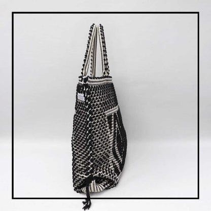 Capriccioli Large - The bag is made using authentic Sardinian hand weaving methods in ethically managed factories. This tote bag is extraordinary and evokes faraway cultures with a contemporary touch, with focus on details such as colour, and material that are sustainable and eco-conscious