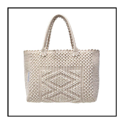 Antonello Tedde tote bag is made using hand woven fabrics Made of Italian Linen and regenerated Cotton , it is unlined with a practical inner pocket and a diamond pattern. A magnet fastens the bag keeping it secure. The bag is made using authentic Sardinian hand weaving methods in ethically managed factories. 