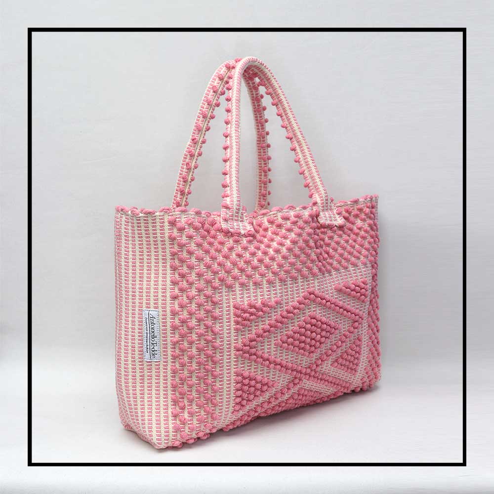 Antonello Tedde tote bag is made using hand woven fabrics Made of Italian Linen and regenerated Cotton , The bag is made using authentic Sardinian hand weaving methods in ethically managed factories.