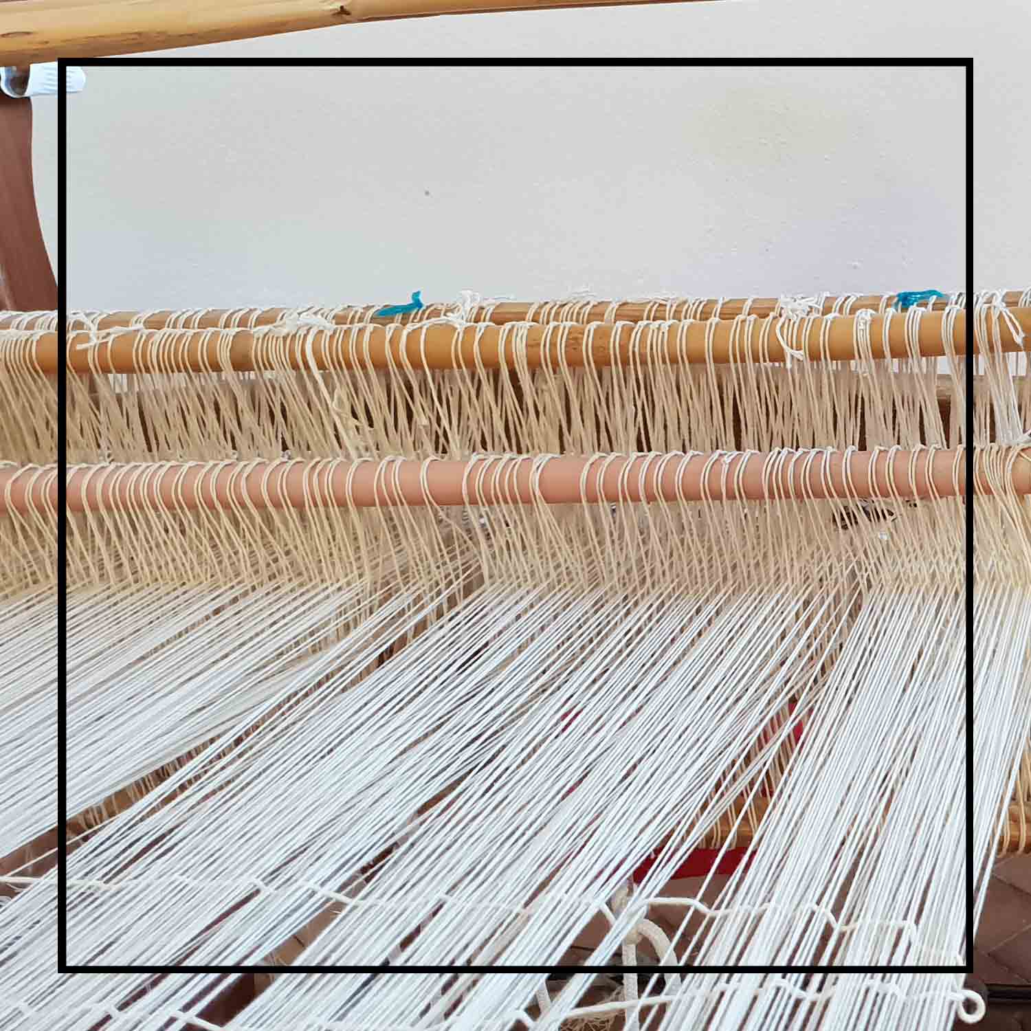 The wooden loom view where the turquoise tote bag is made this is a winter or summer bag - luxury handbag - handwoven tote made in Italy by hand • timeless individualistic fashion • eco-friendly fashion • socially responsible, lasting fashion