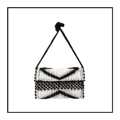 Main view of the Suni Rombi Crossbody Bag by Antonello Tedde – Handwoven Sustainable Cotton Bag in Black and Cream with Rombetti Pattern, Ethical and Timeless Italian Craftsmanship. 