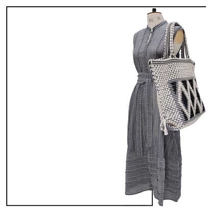 Tote on Model - styled on shoulder - Sustainable tote - summer bag - luxury handbag - handwoven black and white tote made in Italy by hand • timeless individualistic fashion • eco-friendly fashion • socially responsible, lasting fashion, 